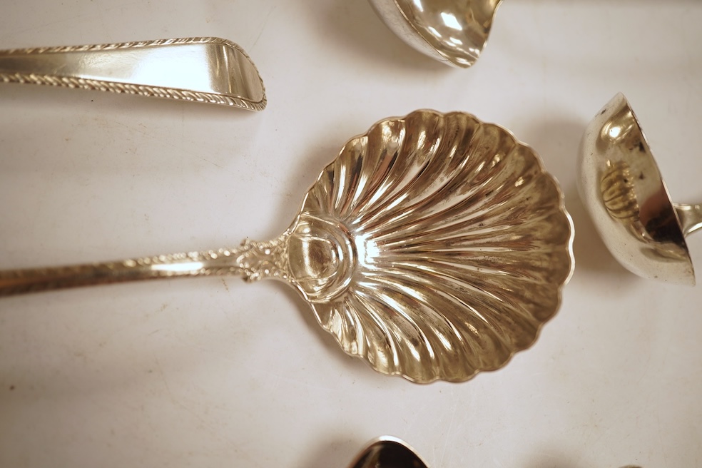 A pair of George III silver feather edge Old English pattern sauce ladles, with shell bowls, London, 1771?, 17.6cm, together with a pair of George III Scottish silver toddy ladles, George Fenwick, Edinburgh, 1816, one ot
